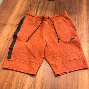 Orange and black, Nike shorts, men’s medium